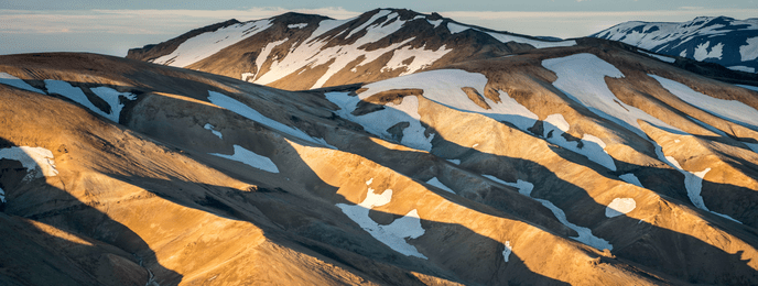 Structural shot of white mountains from above