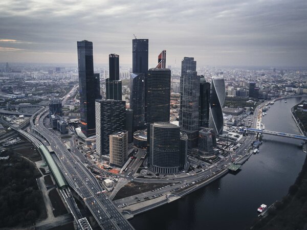 Skycrapers in city surrounded by smaller buildings as representation of core values at globaldatanet