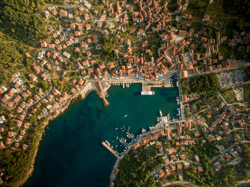 Settlements on two sides of a river with structured ports showing the clear foundation globaldatanet is built on